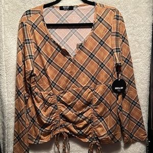 Long sleeve plus size tan or khaki colored shirt